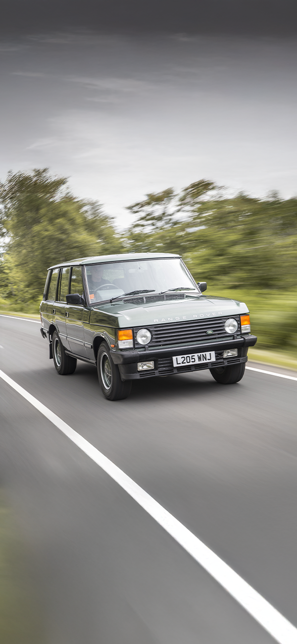 Classic Range Rover 'L205 WNJ' driving at speed.