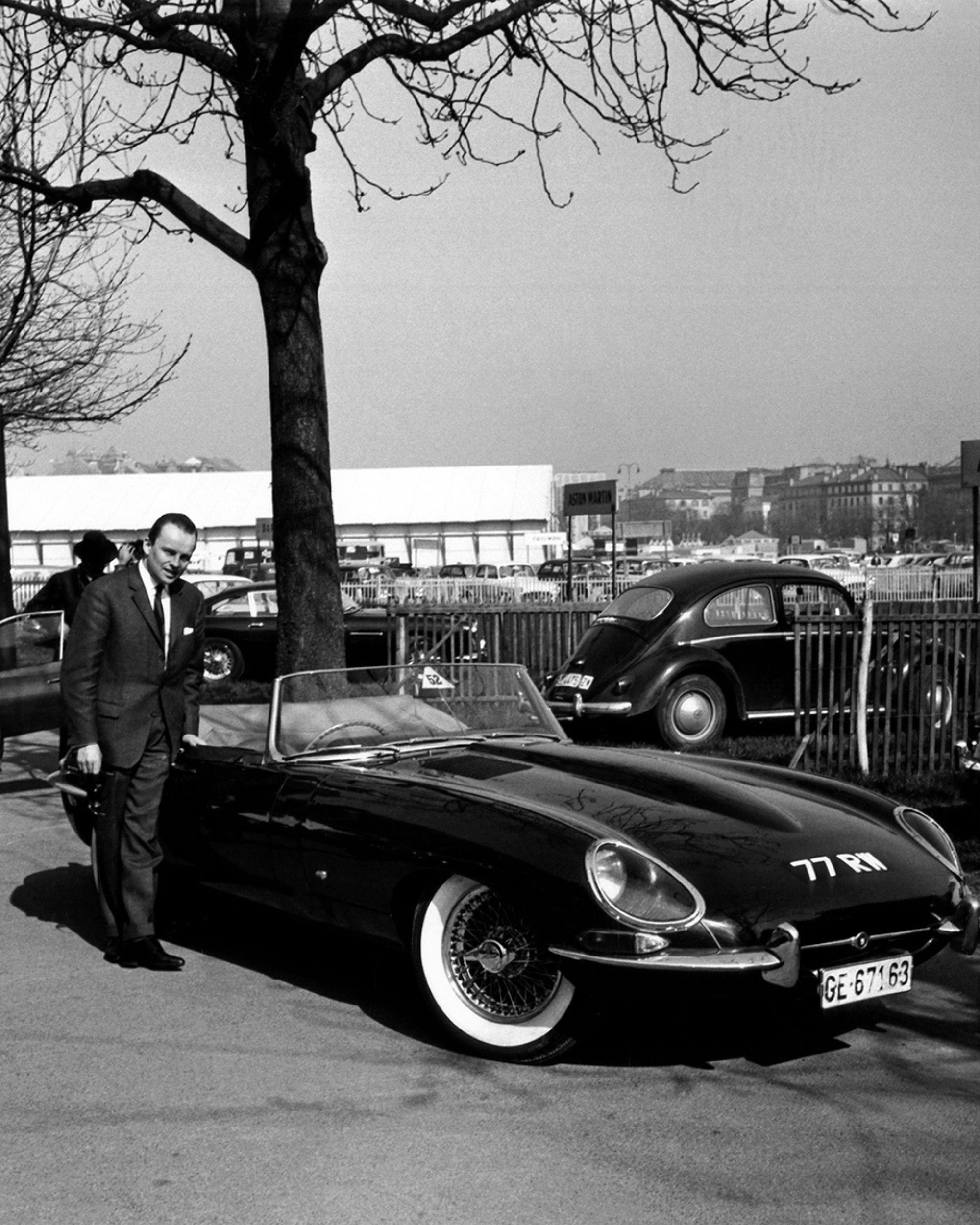 Historic black and white photo of Jaguar E-Type '77 RW'.